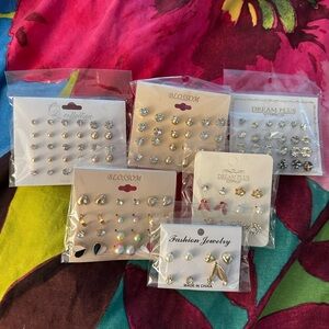 Large group of tiny stud earrings
